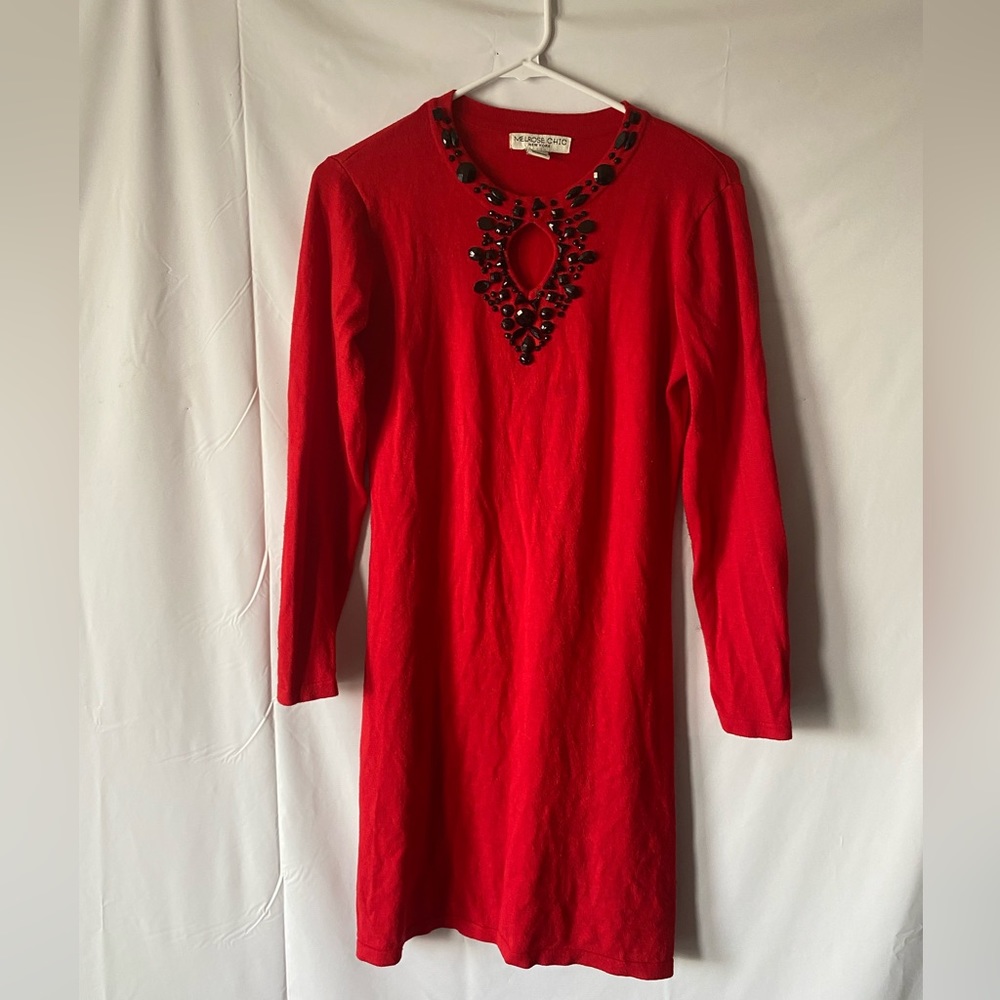 Red long sleeve dress with black accessories